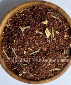 Houten kom met biologische Rooibos Lemon Ginger; ideaal voor wie detox thee kopen wil.