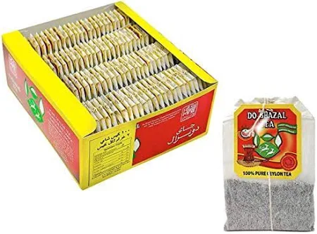 Doos Do Ghazal Ceylon zwarte thee uit Sri Lanka en een theezakje. Thee sri lanka productafbeelding.