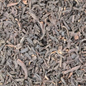 Zwarte Ceylon Uva Highland thee met cafeïne, losse theebladeren voor een aromatische en krachtige smaak.
