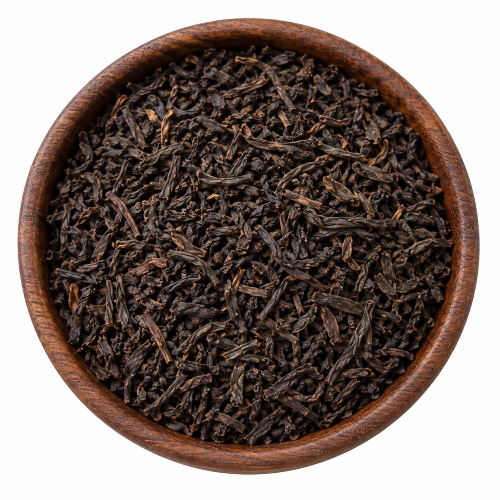 Sfeerbeeld van zwarte Ceylon thee in een rond bakje; originele productverpakking in de galerij